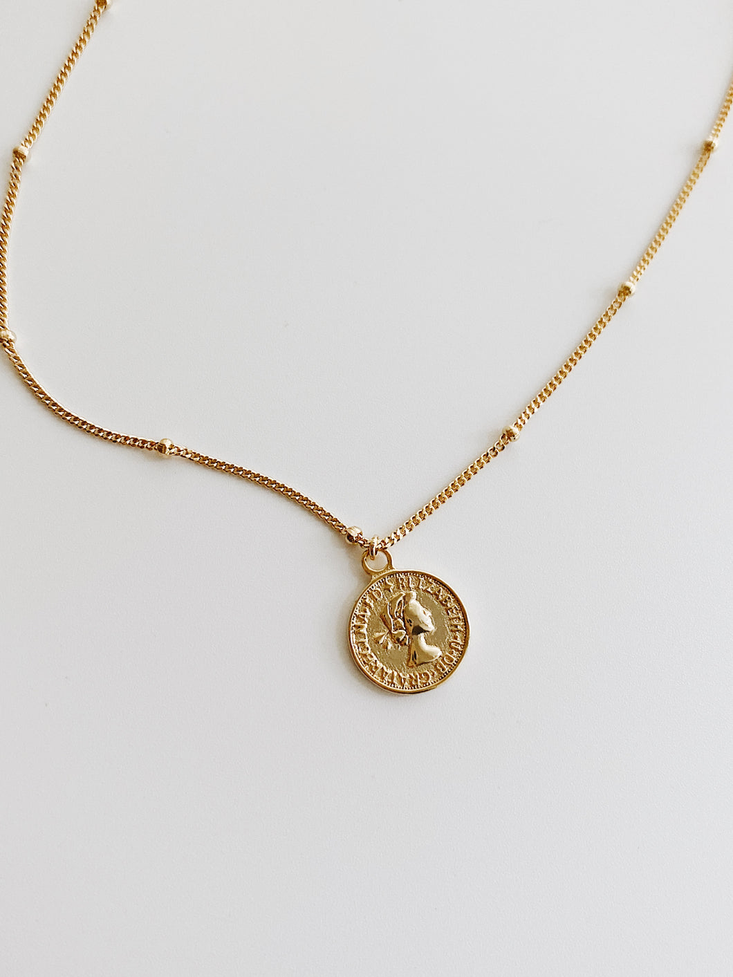 Queen coin gold bobble chain necklace