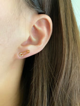Gold safety pin stud earrings