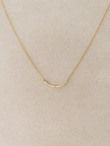 Curved gold CZ bar necklace