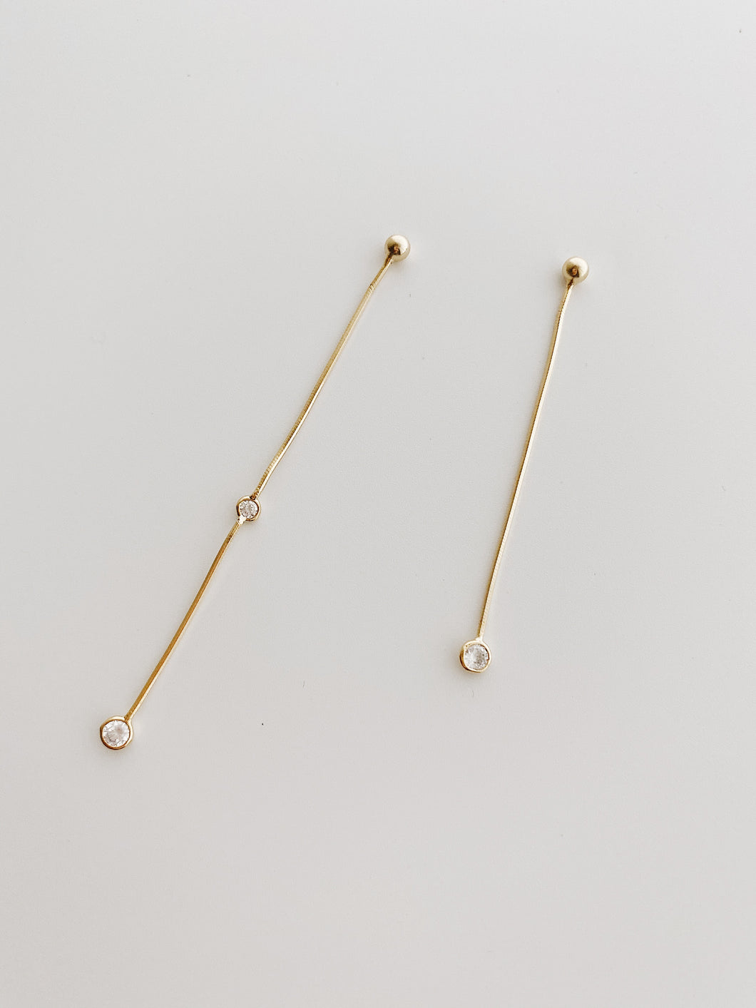 Gold snake chain mismatch CZ earrings