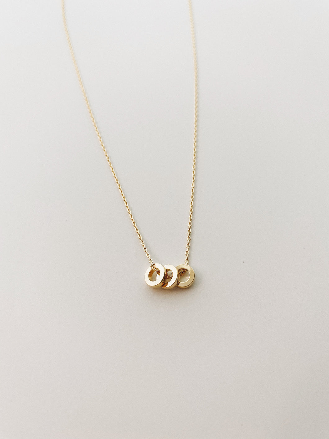Triple ring necklace
